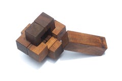 Concept de travail d'équipe d'affaires : Brain Teaser en bois ou puzzles en bois photographie stock libre de droits Concept de travail d'équipe d'affaires : Brain Teaser en bois ou puzzles en bois photographie stock libre de droits