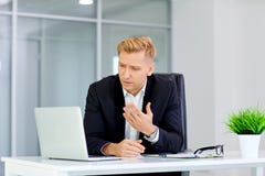The concept of failure, defeat, crisis the business. A man sits stock photography The concept of failure, defeat, crisis the business. A man sits stock photography