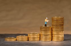 Concept of investment in gold with US Treasury Gold Eagle coins stock photos Concept of investment in gold with US Treasury Gold Eagle coins stock photos
