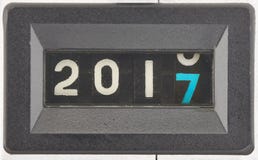 Concept of 2017, New Year. Close Up of The Digits of A Mechanical Counter. Close Up of The Digits of A Mechanical Counter. The Digits is Changing from 2016 to vector illustration Concept of 2017, New Year. Close Up of The Digits of A Mechanical Counter. Close Up of The Digits of A Mechanical Counter. The Digits is Changing from 2016 to vector illustration