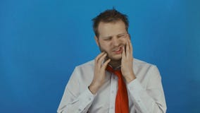 Nervous irritated businessman under stress, unshaven man touches tears his beard stock video footage Nervous irritated businessman under stress, unshaven man touches tears his beard stock video footage