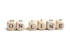 Concept word forming with wooden cube - On line royalty free stock photo Concept word forming with wooden cube - On line royalty free stock photo