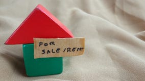 Conceptual Close up Element Design for Property, asset Advertising, for Rent or Sale, Red and Green House at land with wooden stock photos Conceptual Close up Element Design for Property, asset Advertising, for Rent or Sale, Red and Green House at land with wooden stock photos