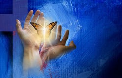 Christian cross with hands setting delicate butterfly free stock image Christian cross with hands setting delicate butterfly free stock image