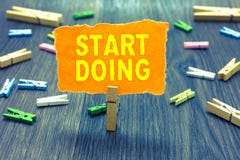 Conceptual hand writing showing Start Doing. Business photo text asking someone to go with action right now dont hesitate Clothesp royalty free stock photography Conceptual hand writing showing Start Doing. Business photo text asking someone to go with action right now dont hesitate Clothesp royalty free stock photography