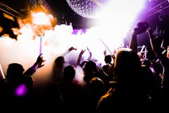 silhouettes of concert crowd in front of bright stage lights royalty free stock images silhouettes of concert crowd in front of bright stage lights royalty free stock images