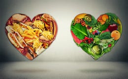 Concetto choice di dilemma di dieta e di salute del cuore immagine stock libera da diritti Concetto choice di dilemma di dieta e di salute del cuore immagine stock libera da diritti