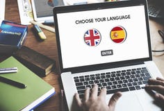 Concetto di inglese-spagnolo del dizionario di lingua immagine stock Concetto di inglese-spagnolo del dizionario di lingua immagine stock