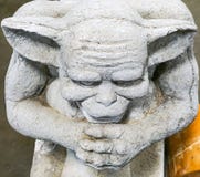 A concrete statue of a garden Gargoyle. A close up concrete statue of a garden Gargoyle Royalty Free Stock Photos A concrete statue of a garden Gargoyle. A close up concrete statue of a garden Gargoyle Royalty Free Stock Photos