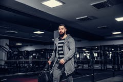 Confident young sportsmen leaving gym Royalty Free Stock Image Confident young sportsmen leaving gym Royalty Free Stock Image