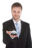 Confident Businessman Holding Service Bell stock images Confident Businessman Holding Service Bell stock images
