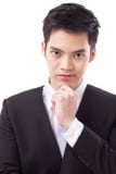 Confident businessman thinking, planning, getting a good idea studio Royalty Free Stock Photography Confident businessman thinking, planning, getting a good idea studio Royalty Free Stock Photography