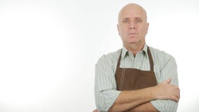 Confident Image with a Man Wearing Apron Keeping Arms Crossed stock photos Confident Image with a Man Wearing Apron Keeping Arms Crossed stock photos