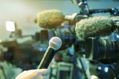 Conférence de presse Filmer un événement avec une caméra vidéo photos stock Conférence de presse Filmer un événement avec une caméra vidéo photos stock