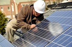 Connecting Solar Panels royalty free stock photography Connecting Solar Panels royalty free stock photography