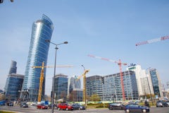 Construction cranes build houses in a big city.night. warsaw spire. Warszawa. City. Poland stock photo Construction cranes build houses in a big city.night. warsaw spire. Warszawa. City. Poland stock photo