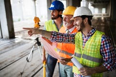 Construction engineer with foreman worker checking construction site royalty free stock images Construction engineer with foreman worker checking construction site royalty free stock images