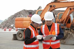 Construction worker and excavator royalty free stock image Construction worker and excavator royalty free stock image
