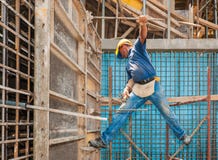 Construction Worker On Scaffold And Formwork Royalty Free Stock Image Construction Worker On Scaffold And Formwork Royalty Free Stock Image