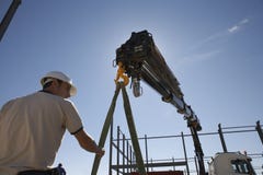 Construction Worker Unloading Material From Truck stock images Construction Worker Unloading Material From Truck stock images