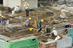 Construction workers at high-rise building