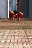 Construction Workers Install Rebar - Vertical Royalty Free Stock Photography Construction Workers Install Rebar - Vertical Royalty Free Stock Photography