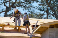 Construction Workers Wearing Safety Harness Lifeline Royalty Free Stock Photography Construction Workers Wearing Safety Harness Lifeline Royalty Free Stock Photography