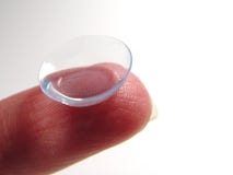 Contact Lense On Finger