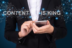 Content Is King concept, Businesswoman using mobile smart phone, Social, media royalty free stock photography Content Is King concept, Businesswoman using mobile smart phone, Social, media royalty free stock photography
