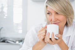 Content woman having coffee in the morning stock images Content woman having coffee in the morning stock images