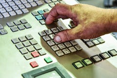 The control panel of the program of work on the control panel of the precision CNC machining center, the processing of the manufac stock photo The control panel of the program of work on the control panel of the precision CNC machining center, the processing of the manufac stock photo