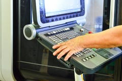 The control panel of the program of work on the control panel of the precision CNC machining center, the processing of the manufac stock image The control panel of the program of work on the control panel of the precision CNC machining center, the processing of the manufac stock image