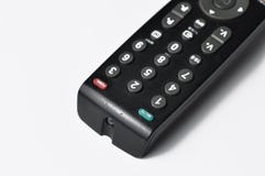 Controlador remoto para uma tevê isolada em um fundo branco Copie o espa?o imagem de stock Controlador remoto para uma tevê isolada em um fundo branco Copie o espa?o imagem de stock