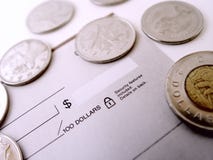 Controle con las monedas imagen de archivo libre de regalías Controle con las monedas imagen de archivo libre de regalías