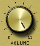 Controle de volume onze do ouro Imagem de Stock Controle de volume onze do ouro Imagem de Stock