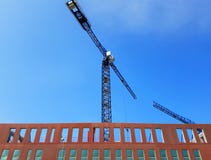 Γερανοί σε μια περιοχή contruction στοκ φωτογραφίες Γερανοί σε μια περιοχή contruction στοκ φωτογραφίες