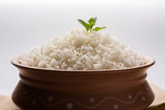 Cooked plain white basmati rice in terracotta bowl, selective focus stock images Cooked plain white basmati rice in terracotta bowl, selective focus stock images