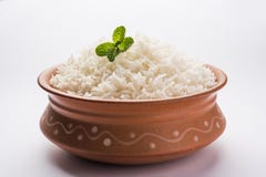 Cooked plain white basmati rice in terracotta bowl, selective focus stock image Cooked plain white basmati rice in terracotta bowl, selective focus stock image