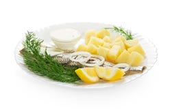 Cooked Potatoes With Herring And Sauce Stock Images