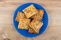 Cookies with sunflower seeds and sesame in blue plate Royalty Free Stock Photos Cookies with sunflower seeds and sesame in blue plate Royalty Free Stock Photos