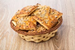 Cookies with sunflower seeds and sesame in wicker basket Royalty Free Stock Photography Cookies with sunflower seeds and sesame in wicker basket Royalty Free Stock Photography