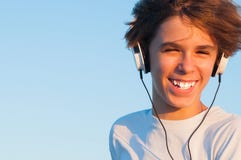 Cool Boy Listening to Music Royalty Free Stock Image Cool Boy Listening to Music Royalty Free Stock Image