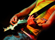 Cool guitarist in rock concert