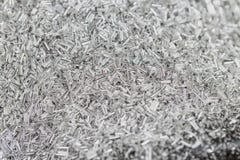Copeaux en aluminium exture des puces en aluminium Foyer sélectif photo stock Copeaux en aluminium exture des puces en aluminium Foyer sélectif photo stock