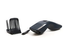 Cordless machine for a hairstyle on white royalty free stock photos Cordless machine for a hairstyle on white royalty free stock photos