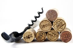 Corkscrew And Corks As Pyramid Royalty Free Stock Images