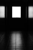 Monochrome picture. Dark corridor with intense light from window. stock photography Monochrome picture. Dark corridor with intense light from window. stock photography