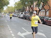 Corsa solidale a Murcia, il 24 marzo 2019: Prima corsa di solidarietà sulle vie di Murcia in Spagna immagine stock Corsa solidale a Murcia, il 24 marzo 2019: Prima corsa di solidarietà sulle vie di Murcia in Spagna immagine stock