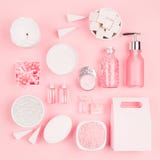 Cosmetic products for bathroom, health and hygiene in modern girlish style - decorative heart, soap, bath salt, essential oil. stock photo Cosmetic products for bathroom, health and hygiene in modern girlish style - decorative heart, soap, bath salt, essential oil. stock photo