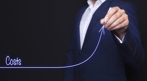 Costs and businessman stock image Costs and businessman stock image